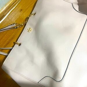 Tory Burch tote bag. Pale pink in color, inside deep pockets. Lots of room.